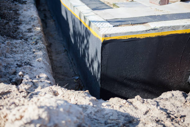 Professional Waterproofing technician working in Rossville, IL